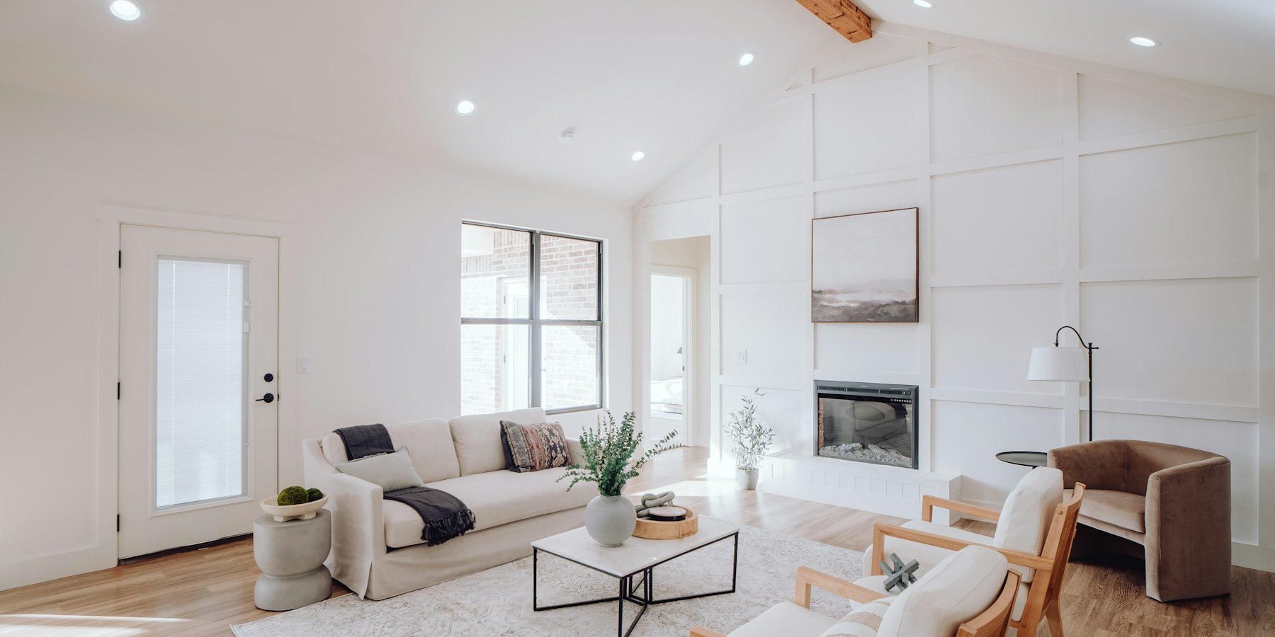Bright white living room with crisp painted trim and walls