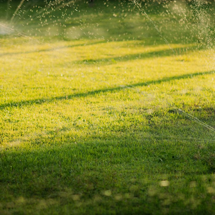 Sprinkler irrigation system watering a lawn