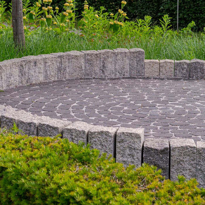 Stone edging around a paver patio